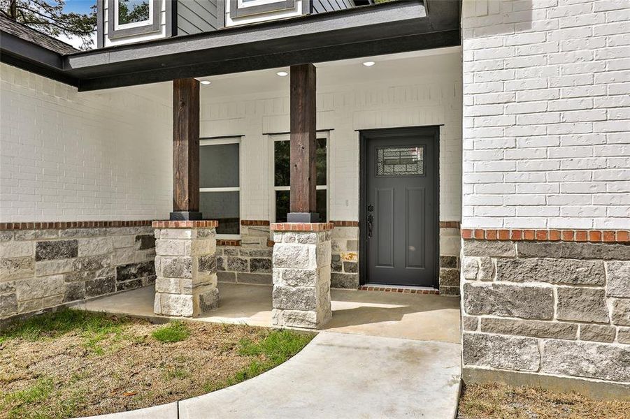 Lovely front porch. Perfect for sipping your morning coffee and enjoying the morning air.