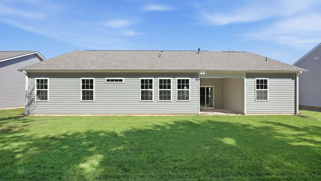 Exterior details and patio area of a home in Tyler - Home on the Lake, New Bern (Image 23).