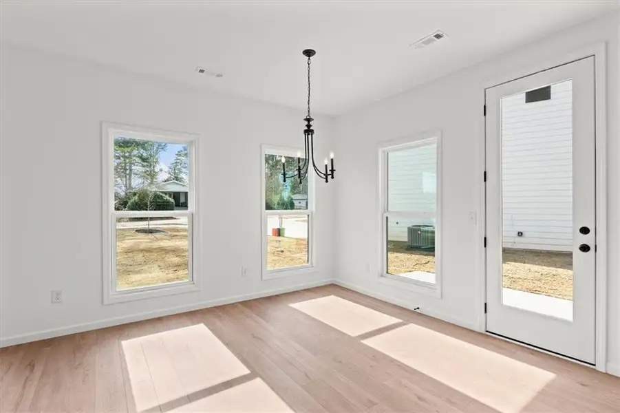 Spacious, unfurnished interior of a new home in , Carrollton (Image 9).