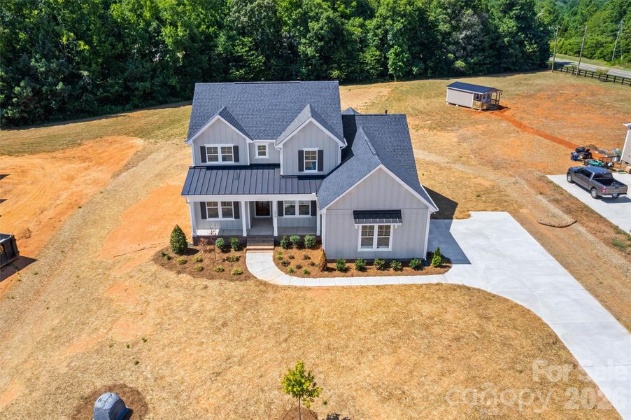 Front exterior of a new home in , Gastonia, NC, highlighting curb appeal (Image 26).