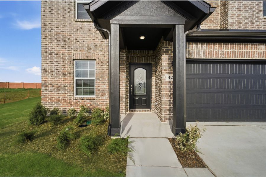 Exterior details and patio area of a home in Saddlebrook Estates, Waxahachie (Image 3). Exterior details and patio area of a home in Saddlebrook Estates, Waxahachie (Image 3).