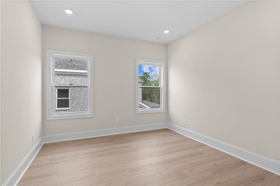 Spacious, unfurnished interior of a new home in Bellwyn, Johns Creek (Image 23).