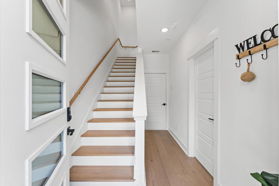 Welcome guests in style with this thoughtfully designed entrance hallway, where clean lines and warm finishes set the tone for the rest of the home. Welcome guests in style with this thoughtfully designed entrance hallway, where clean lines and warm finishes set the tone for the rest of the home.