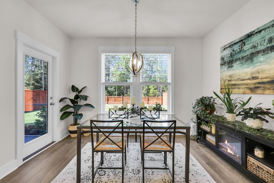 Furnished interior view inside a new home in Jasmine Point at Lakes of Cane Bay, Summerville (Image 12).