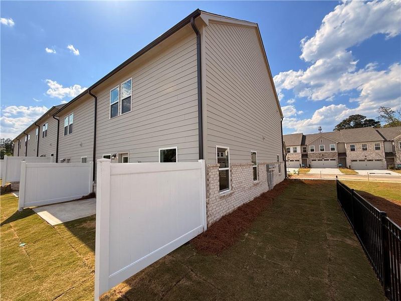 Exterior details and patio area of a home in Leydenview, Mableton (Image 25).