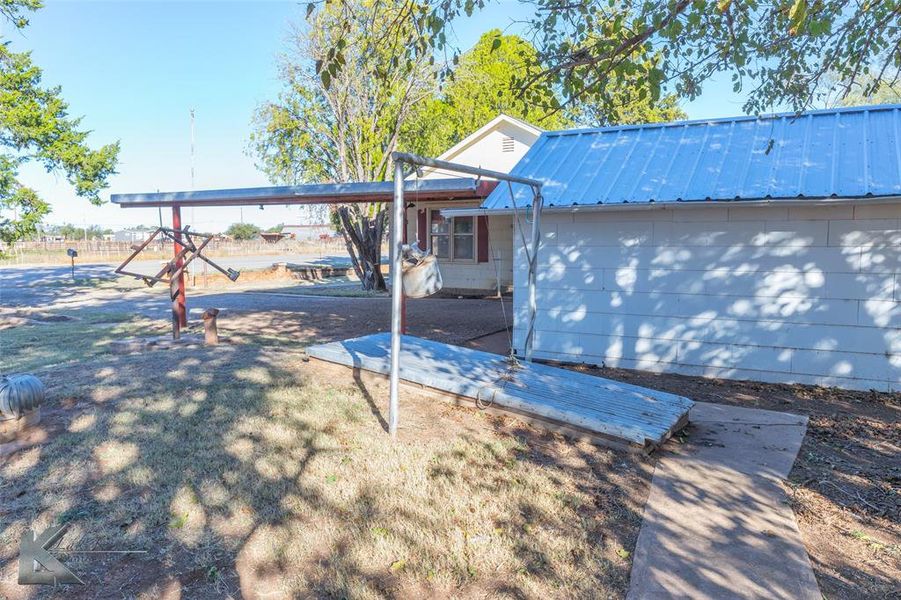 View of front facade with a metal roof View of front facade with a metal roof