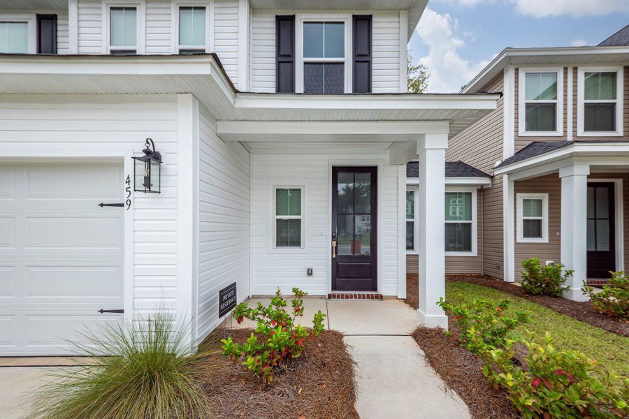Front exterior of a new home in Hampton Woods, Summerville, SC, highlighting curb appeal (Image 23). Front exterior of a new home in Hampton Woods, Summerville, SC, highlighting curb appeal (Image 23).