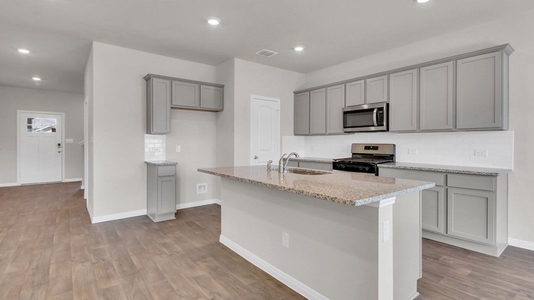 Representative furnished interior of a home built from the The Naples by D.R. Horton in Trails at Wildhorse, Austin (Image 10). Representative furnished interior of a home built from the The Naples by D.R. Horton in Trails at Wildhorse, Austin (Image 10).