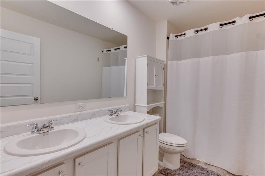 Furnished interior view inside a new home in The Reserve at Calcutta, Stockbridge (Image 28).