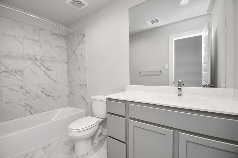 Sample photo of completed home with similar floor plan. Actual colors and selections may vary.