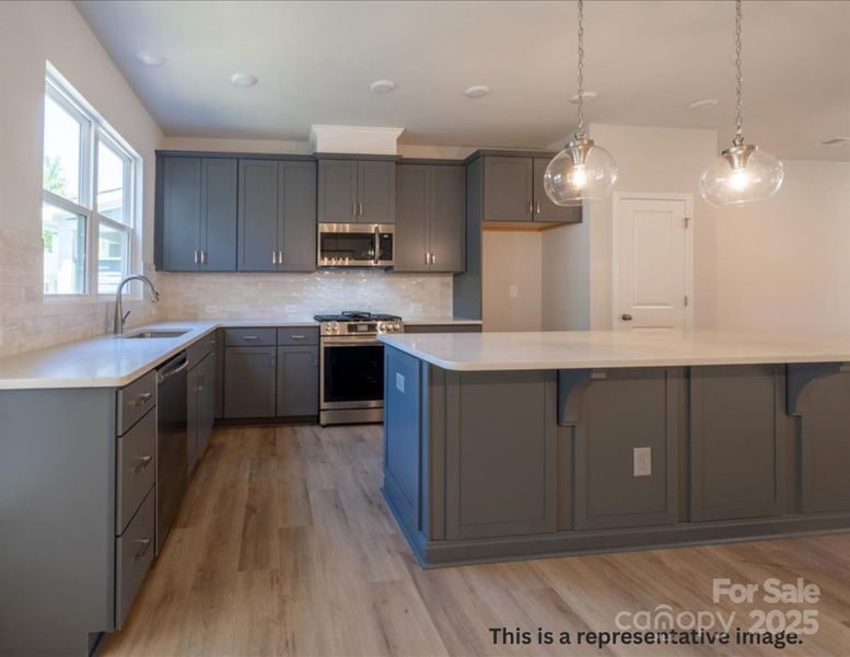 Furnished interior view inside a new home in North Creek Village, Huntersville (Image 4).
