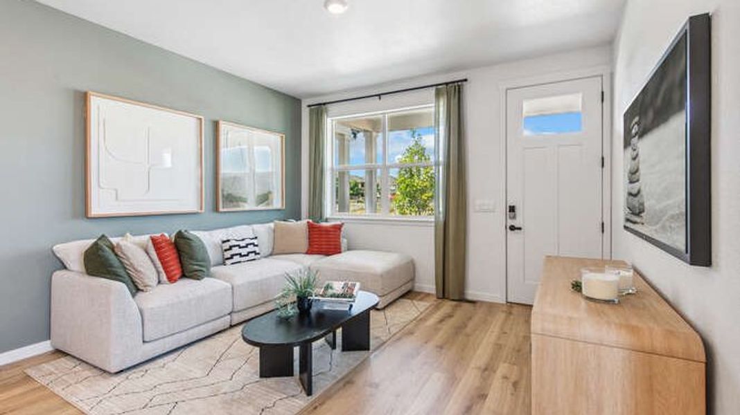Representative furnished interior of a home built from the Melbourne by D.R. Horton in Arcadia, Denver (Image 5).