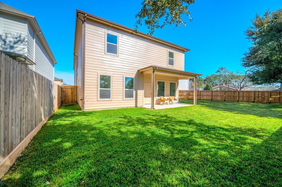 Exterior details and patio area of a home in , Missouri City (Image 26).