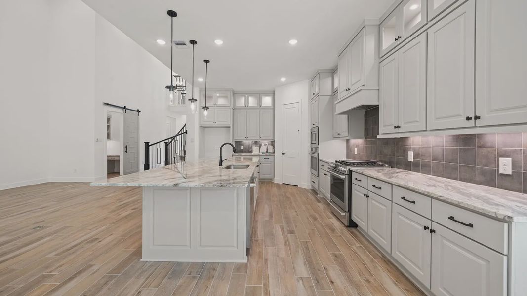Representative furnished interior of a home built from the Waterloo by Chesmar Homes in Attwater 65's, Waller (Image 4).