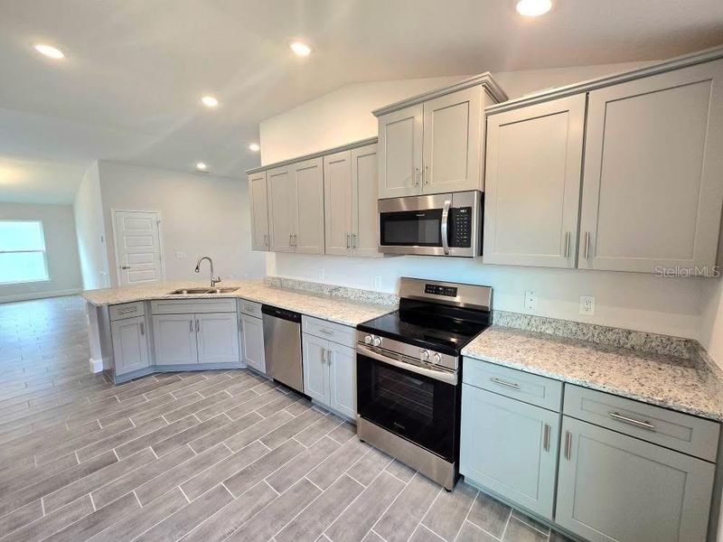 Furnished interior view inside a new home in Watercress Cove, North Port (Image 4). Furnished interior view inside a new home in Watercress Cove, North Port (Image 4).