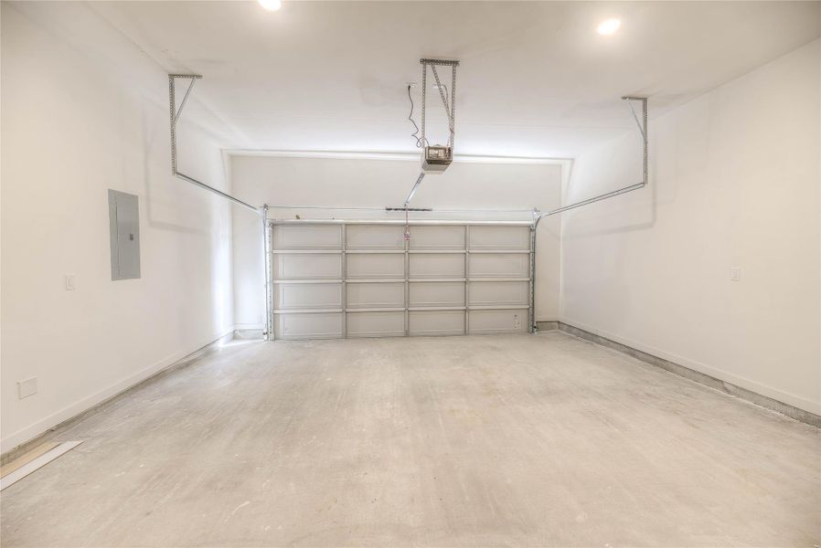 Home Features Double wide drive to 2 car garage.