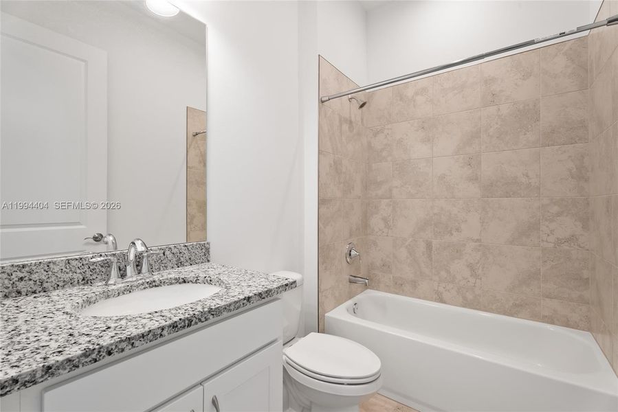 Furnished interior view inside a new home in , Port St. Lucie (Image 13).