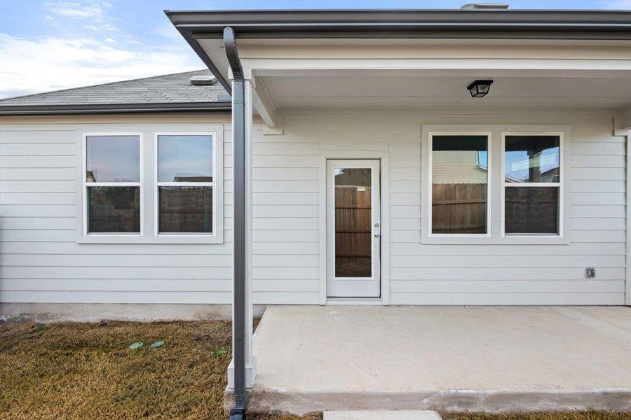 Entrance to property with a patio area