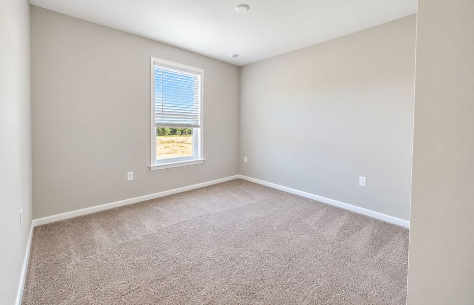 Spacious, unfurnished interior of a new home in Del Webb Wilmington at Mallory Creek, Leland (Image 9).