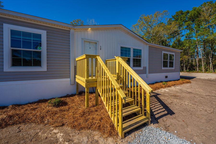 Exterior details and patio area of a home in , Pinopolis (Image 20).