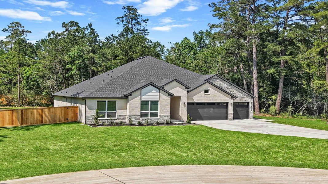 Representative exterior photo of a completed home built from the Portifino by D.R. Horton in Butlers Bend Estates, Pinehurst, TX (Image 2). Representative exterior photo of a completed home built from the Portifino by D.R. Horton in Butlers Bend Estates, Pinehurst, TX (Image 2).