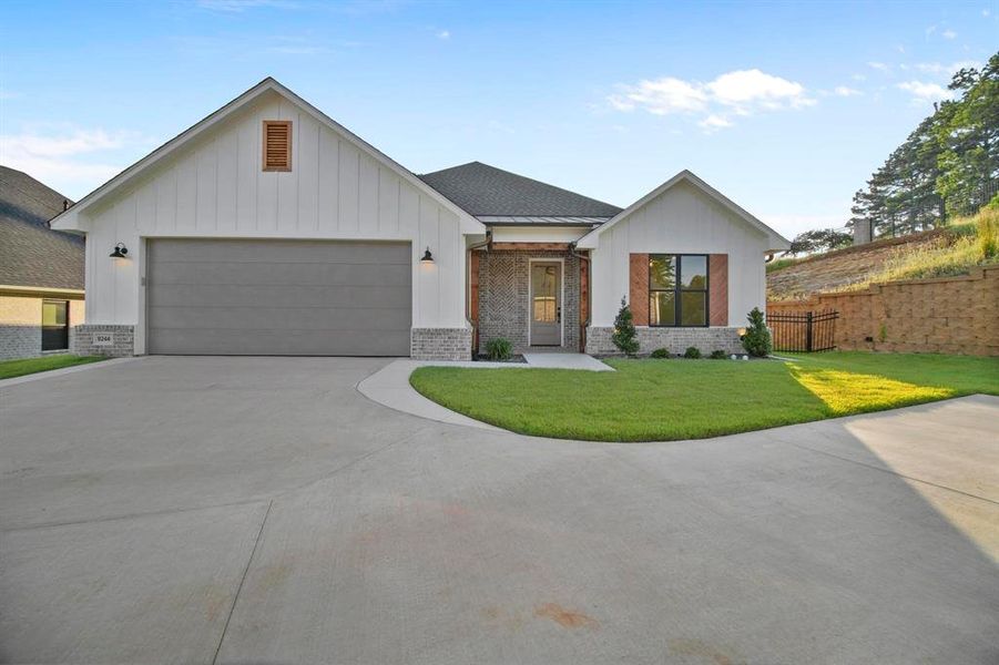 Front exterior of a new home in , Tyler, TX, highlighting curb appeal (Image 26). Front exterior of a new home in , Tyler, TX, highlighting curb appeal (Image 26).