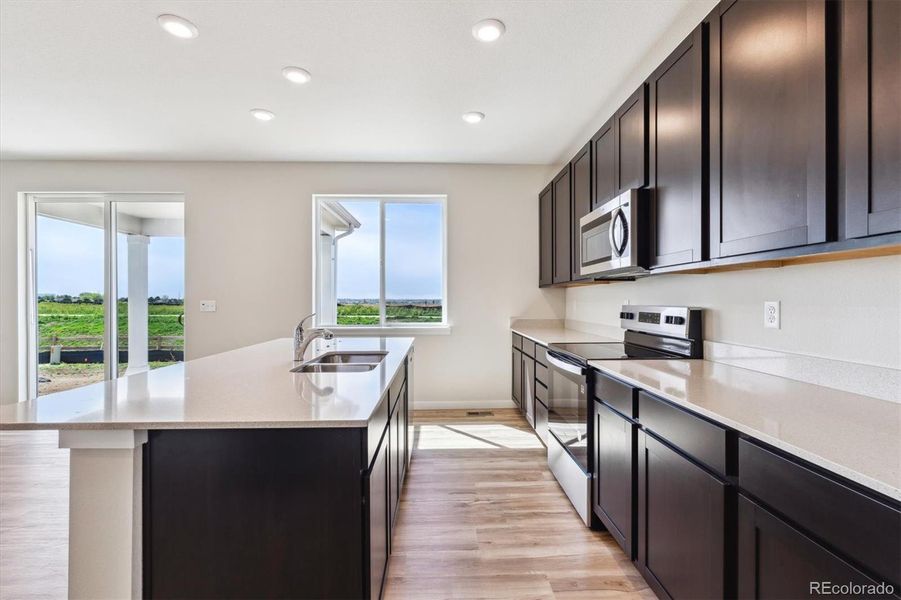 Furnished interior view inside a new home in Red Barn Meadows, Mead (Image 8).