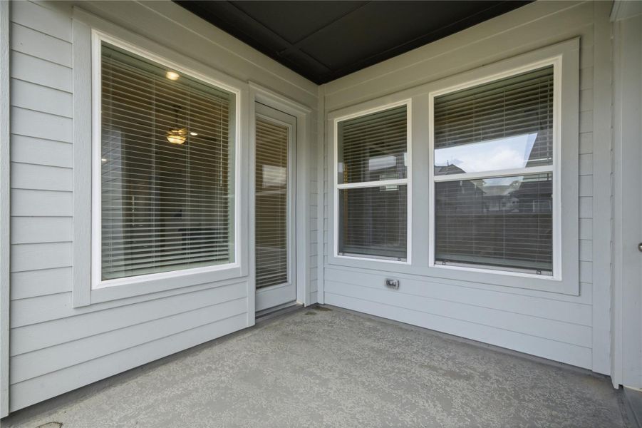 Exterior details and patio area of a home in The Groves 35', Humble (Image 25).