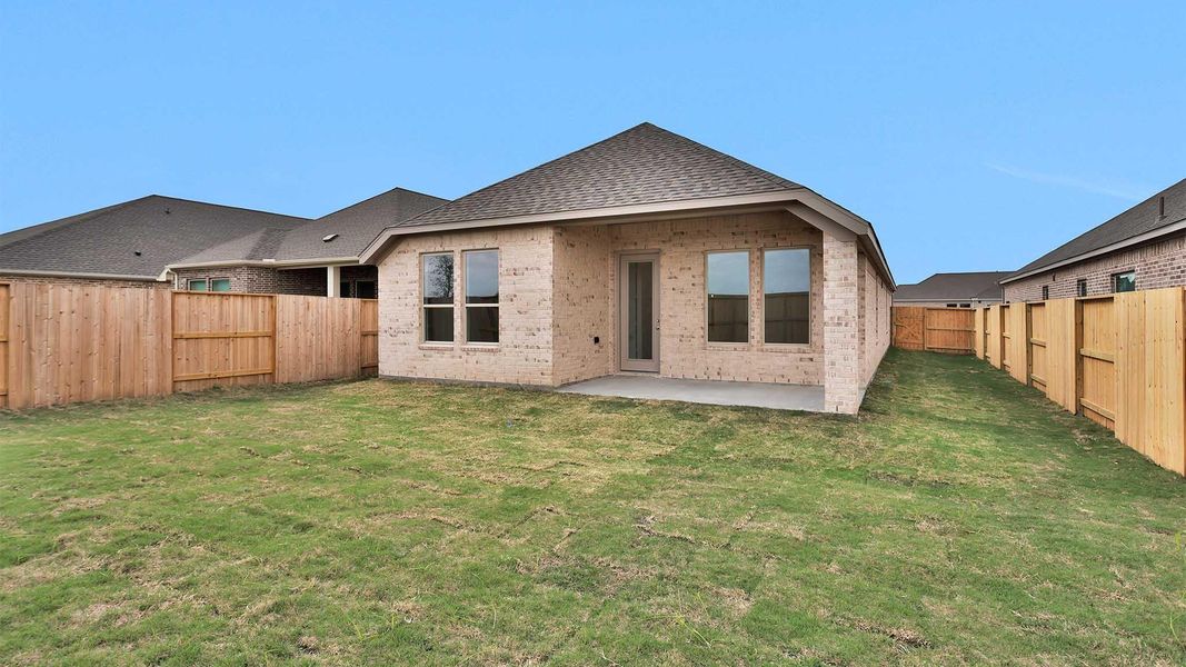 Exterior details and patio area of a home in Meridiana, Manvel (Image 3).