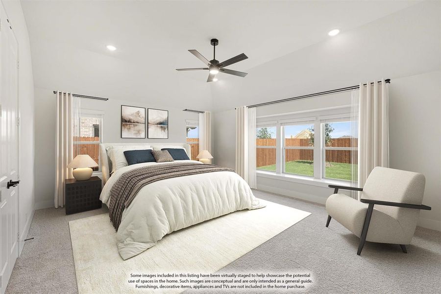 Spacious master bedroom with vaulted ceiling, ceiling fan, large windows, and neutral carpet flooring
