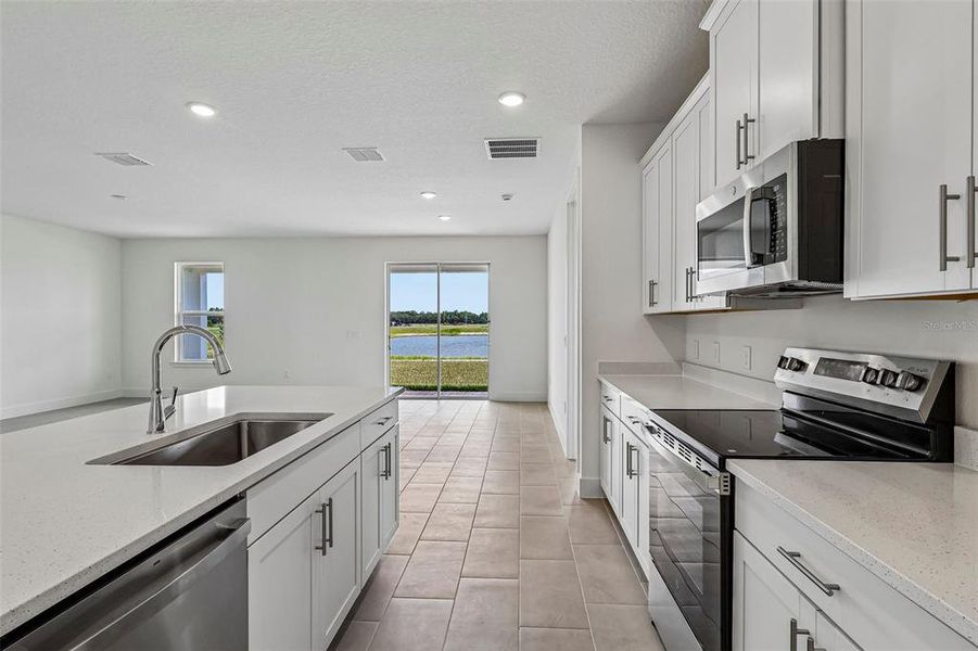 Furnished interior view inside a new home in Lakeside at Satilla, St. Cloud (Image 6).