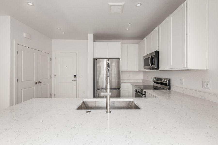 Furnished interior view inside a new home in The Scene at Sloan's Lake, Denver (Image 7).