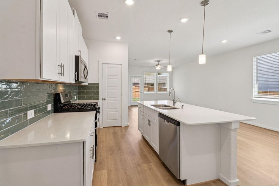 Furnished interior view inside a new home in Pine Lake Cove - Traditional Series, Montgomery (Image 5).