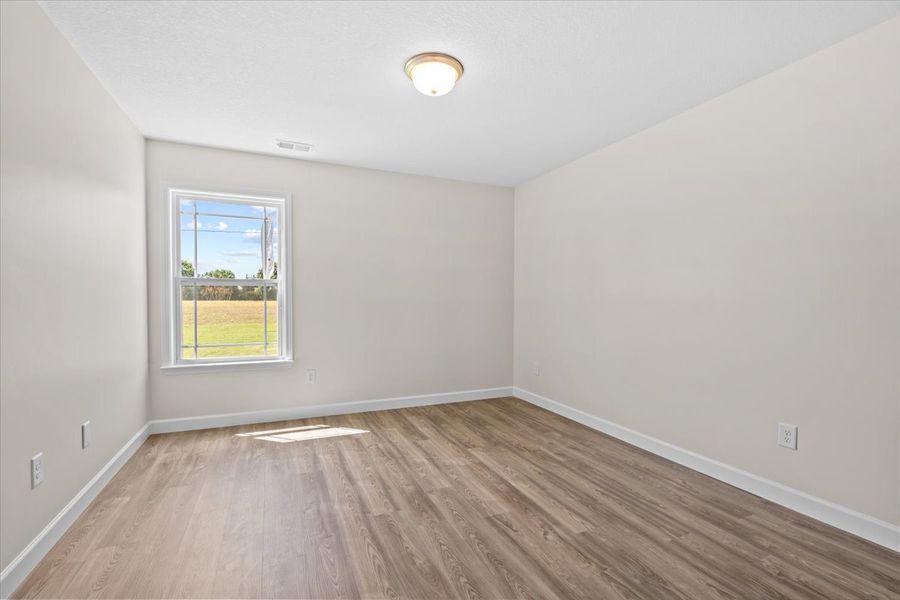 Representative unfurnished interior of a home built from the Fernwood by Enchanted Homes in Guadalupe Heights, Seguin (Image 23).