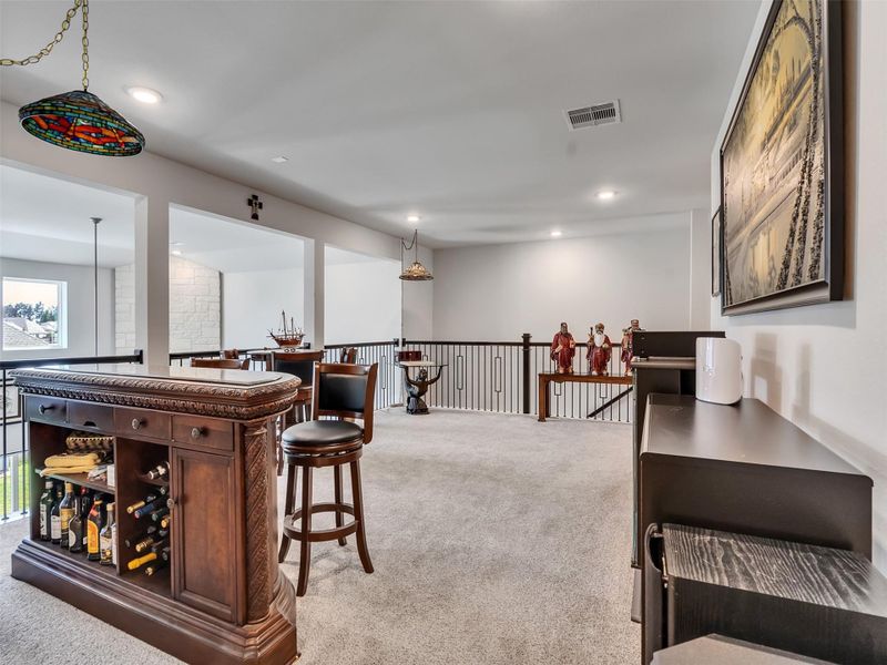 Furnished interior view inside a new home in ARTAVIA, Conroe (Image 31).