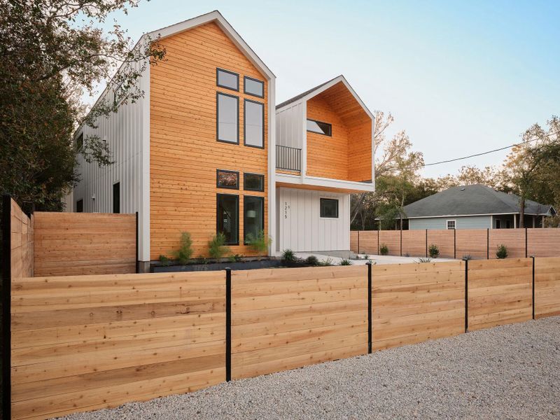 Contemporary house featuring a balcony Contemporary house featuring a balcony