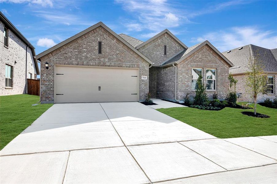 Front exterior of a new home in Elevon, Lavon, TX, highlighting curb appeal (Image 23).