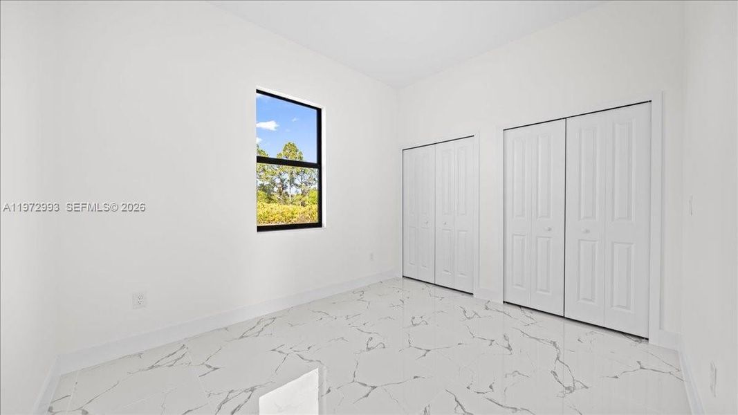 Spacious, unfurnished interior of a new home in , Lehigh Acres (Image 15).