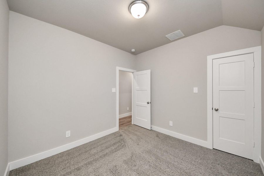 Spacious, unfurnished interior of a new home in Sorella: Signature Collection, Tomball (Image 33).