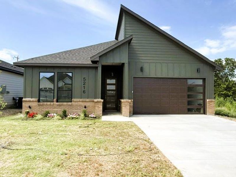 Front exterior of a new home in , Fort Worth, TX, highlighting curb appeal (Image 12). Front exterior of a new home in , Fort Worth, TX, highlighting curb appeal (Image 12).
