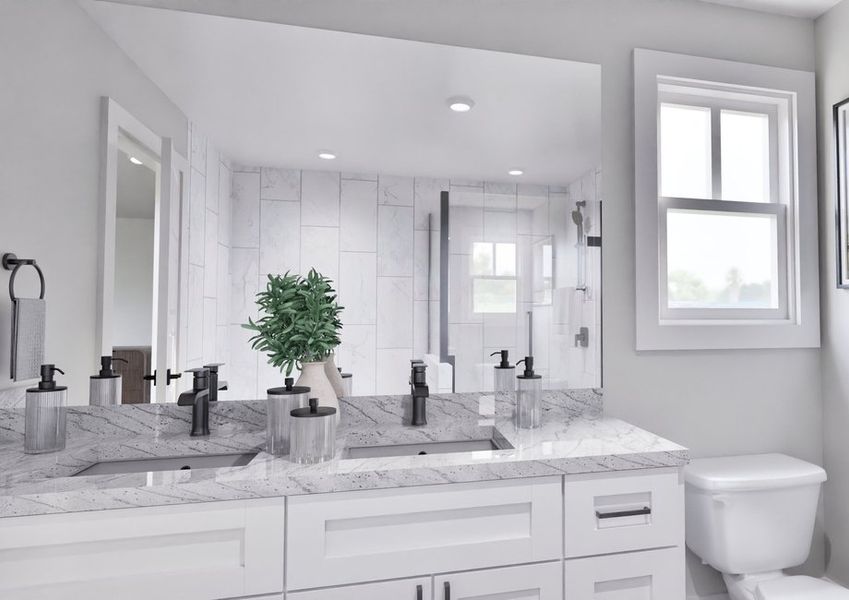 A bathroom featuring white cabinets and a toilet, emphasizing a modern and minimalist design.