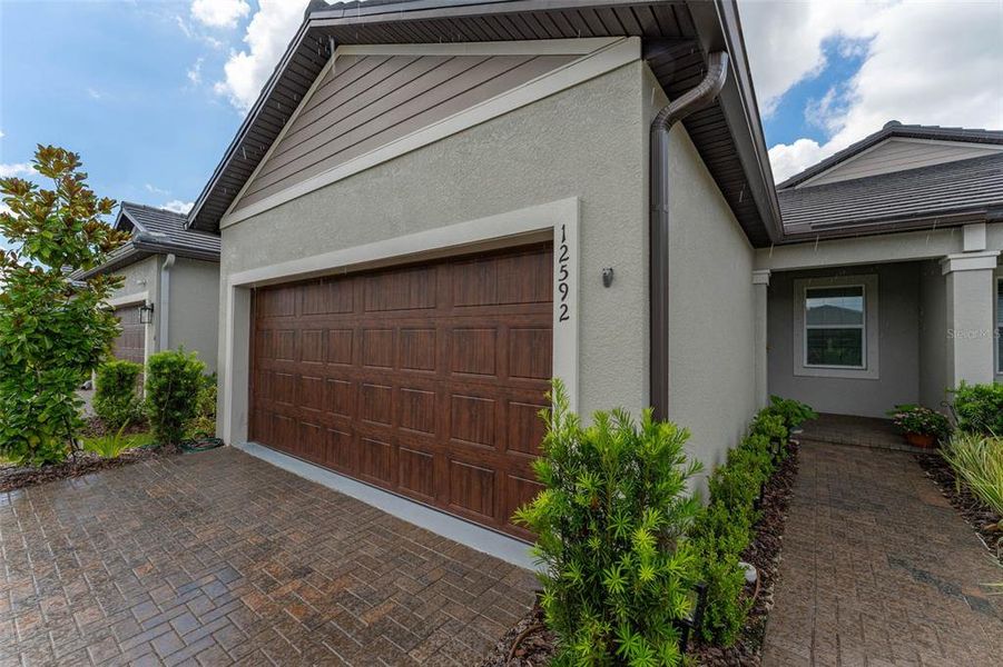 Exterior details and patio area of a home in Prosperity Lakes Active Adult, Parrish (Image 3).