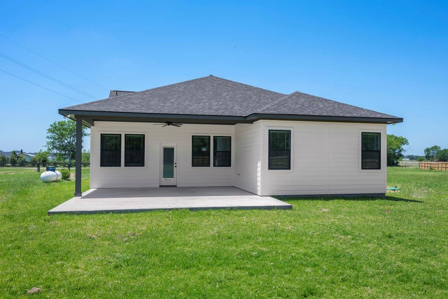 Exterior details and patio area of a home in , Iola (Image 3).