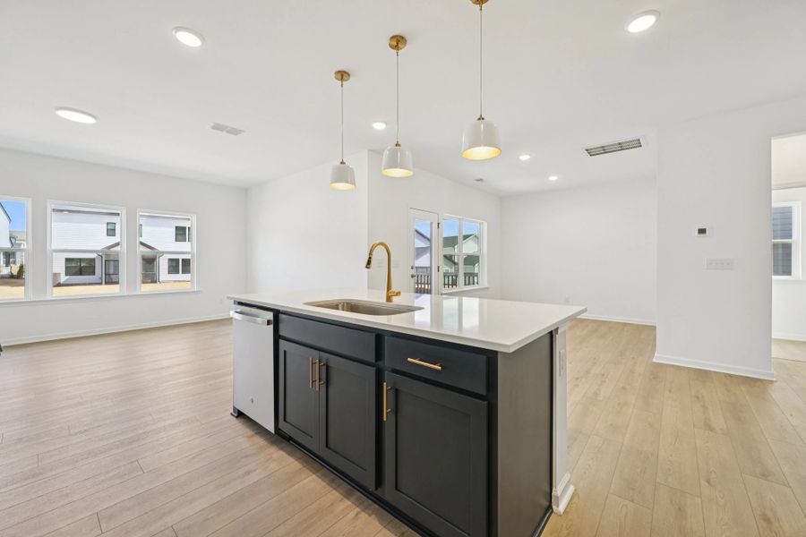 Kitchen featuring the AW Collection® Sapphire - Vibrant blues and crisp whites steal the show.