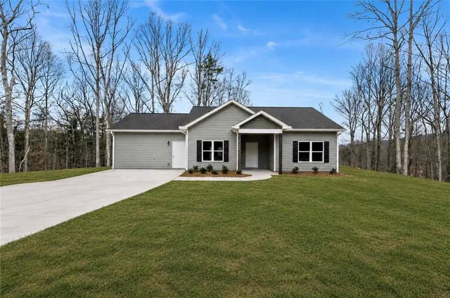 Front exterior of a new home in , Cleveland, GA, highlighting curb appeal (Image 1). Front exterior of a new home in , Cleveland, GA, highlighting curb appeal (Image 1).
