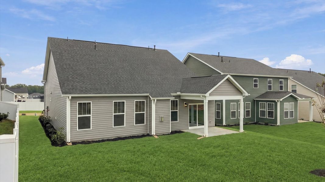 Warm and inviting outdoor living space with a covered rear porch and tasteful finishes near Downtown Spartanburg