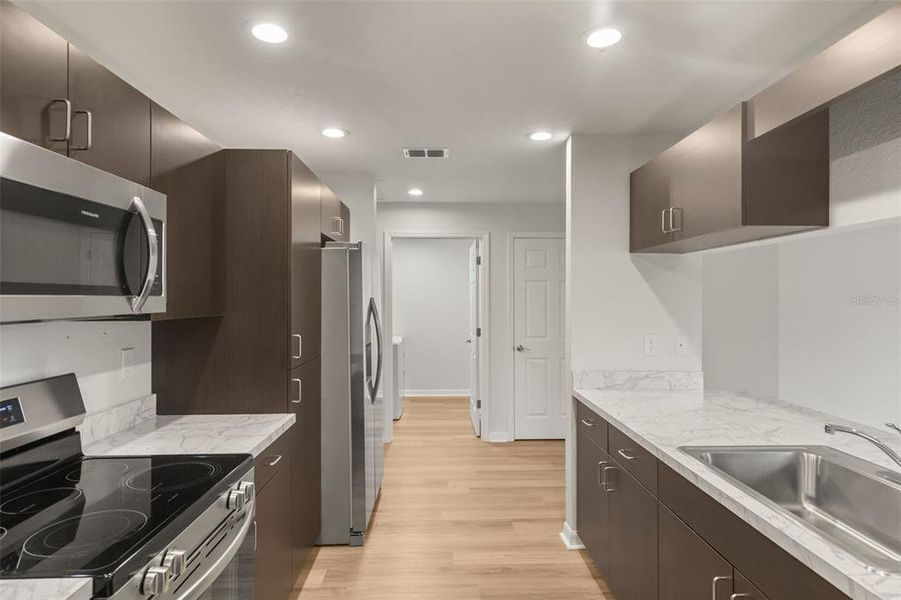 Furnished interior view inside a new home in , Bartow (Image 9).