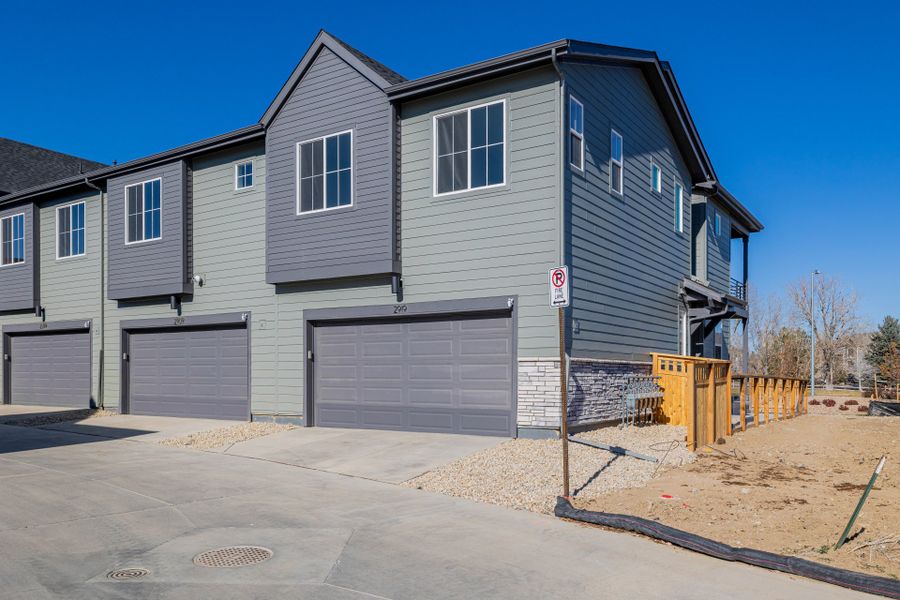 Front exterior of a new home in Arras Park, Thornton, CO, highlighting curb appeal (Image 18).
