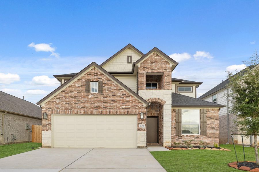 Front exterior of a new home in Morton Creek Ranch, Katy, TX, highlighting curb appeal (Image 14).