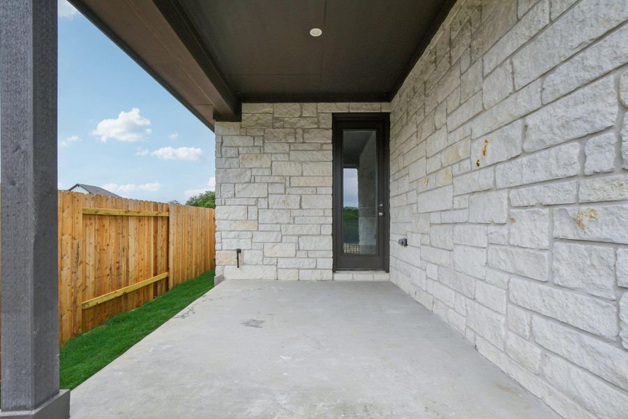 Exterior details and patio area of a home in Persimmon, Buda (Image 4). Exterior details and patio area of a home in Persimmon, Buda (Image 4).